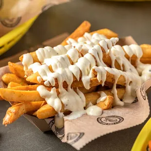 a plate of fries and a salad