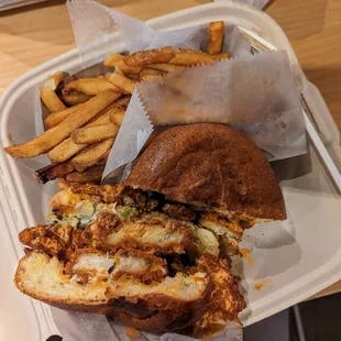 Buffalo chicken sandwich with a side of fries