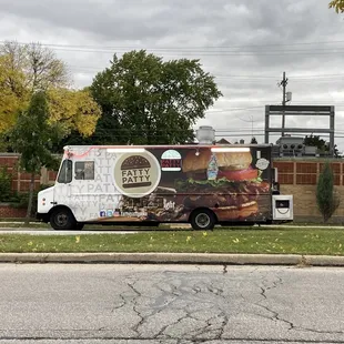 a food truck parked on the side of the road