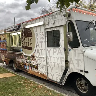a food truck parked on the side of the road