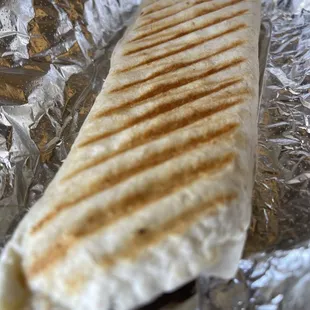 Egg, cheese, and sausage burrito.