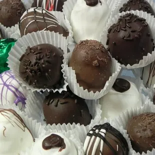 a plate of chocolate truffles