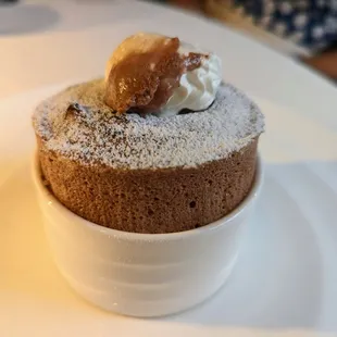 Dessert. Valrhona Coeur de Guanaja Souffle. Dark chocolate, vanilla, whipped cream. Finished tableside.