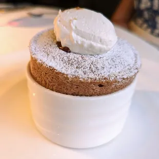 Dessert. Valrhona Coeur de Guanaja Souffle. Dark chocolate, vanilla, whipped cream. Finished tableside.