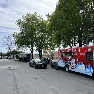 a food truck parked on the side of the road