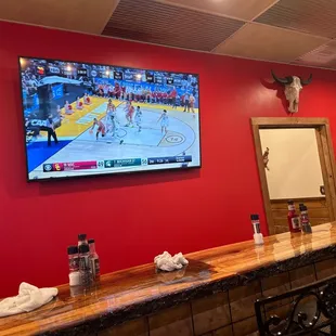 a basketball game on the screen
