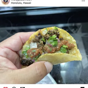 Carne asada taco with handmade tortilla and salsa.