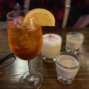 Aperol Spritz, Tullamore Dew Peanut Butter Infusion shots, and a whiskey sour