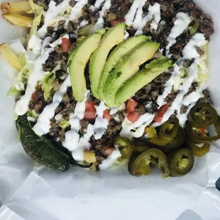 a taco salad with avocado