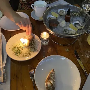 Tallow Candle Bread Service and Oysters on the Half Shell