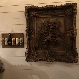 a picture of a skeleton on the wall