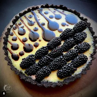 Coconut Custard Pie with Blackberry infused Chocolate and a Chocolate Cookie Crust.