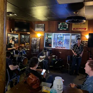 a band playing in a pub
