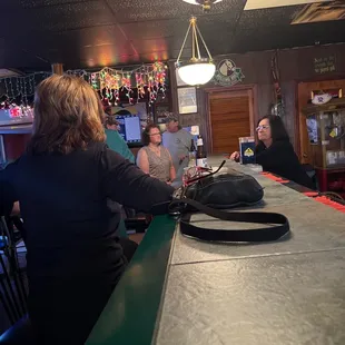 people sitting at the bar