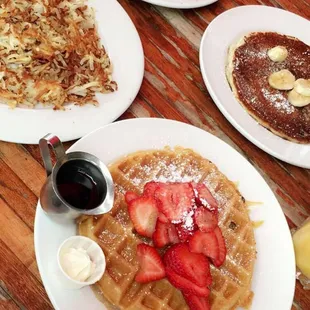 Strawberry Belgian waffle ,caramel banana pancake eggs toast and hash browns ! Love this place