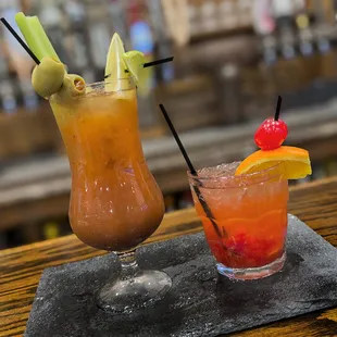 two cocktails on a table