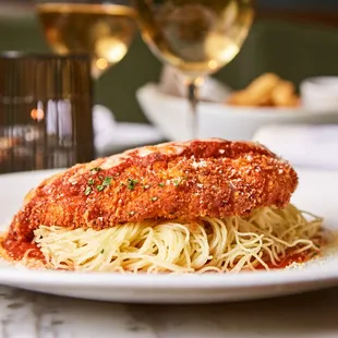 a plate of spaghetti and meat