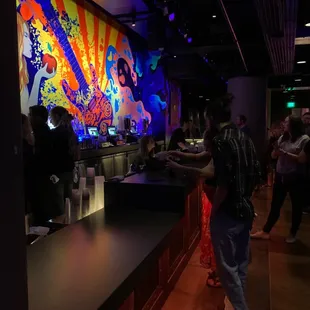 One of the bars on the side of the main floor