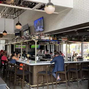 people sitting at the bar