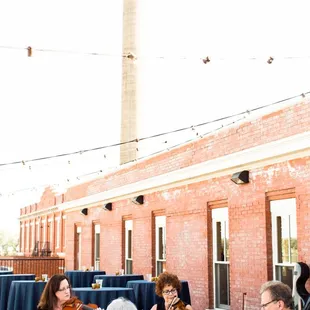 Entertain guests with live music on our lakeside terrace. Photo courtesy: Jenny Bright Photography