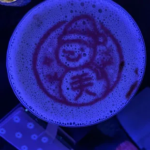 Chocolate martini with holiday art.