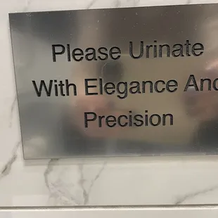 Sign above the toilet cracked me up!