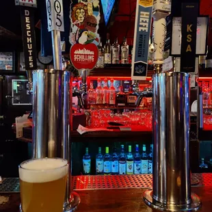 a pint of beer on the bar