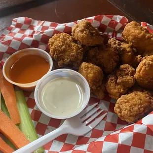 Boneless chicken wings , solid.