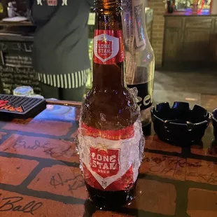 a bottle of beer on a table