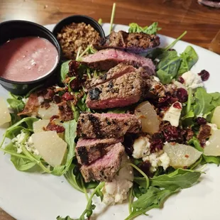 Blue cheese &amp; Pear salad - baby spinach, arugula, I added the sirloin steak.  ( they hand cut steaks)