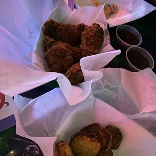 Deep fried pickles and wings, a little overdone