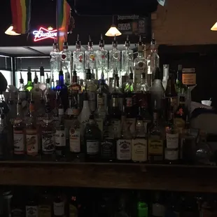 a bar full of alcohol bottles