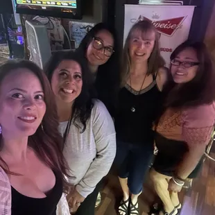 a group of women posing for a picture