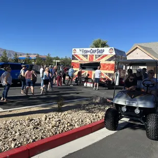 The lines are excited waiting for fish cooked to Order