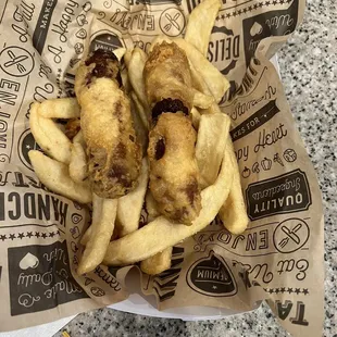 Battered sausages and chips
