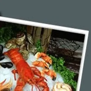 a lobster and crab on ice