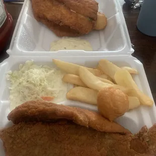 two trays of fish and fries