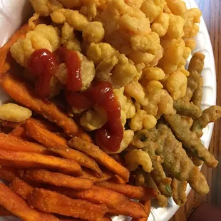 Shrimp, sweet potato fries and fried green beans.