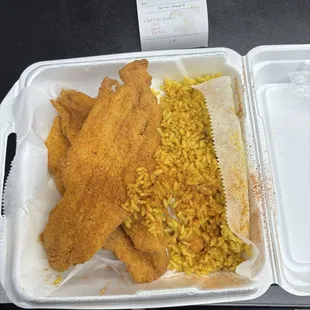 Some delicious catfish and rice with a side of slaw!