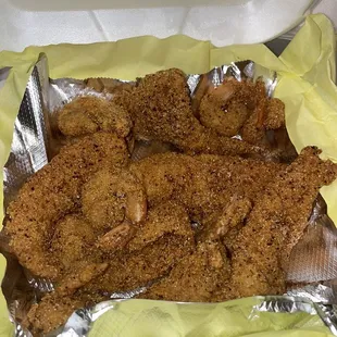 Catfish and shrimp, part of their family meal