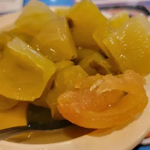 a bowl of food and a spoon