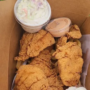 Large plate with snapper. Tartar sauce and house sauce