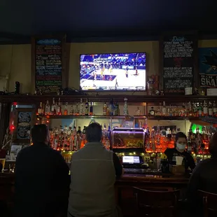 people sitting at the bar