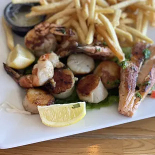 Charbroil sampler with giant prawns scallops and salmon
