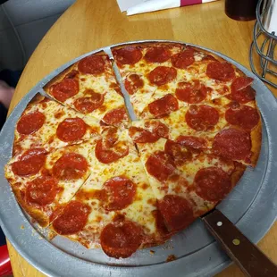 Thin crust pepperoni pizza... light sauce