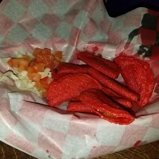 Fried buffalo mini tacos.  Amazing, like spicy Doritos