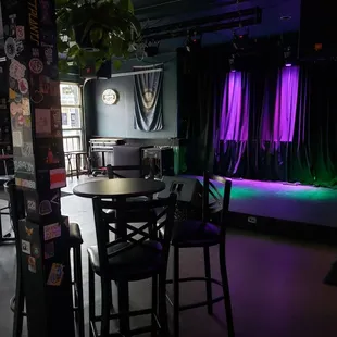a bar with purple lighting