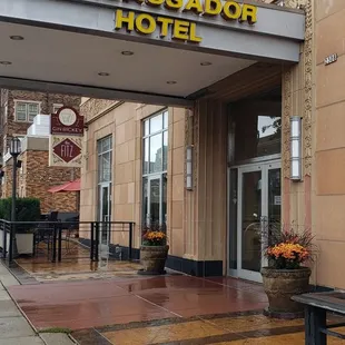 the entrance to the ambassador hotel