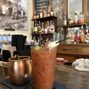 a bloody drink and a copper mug