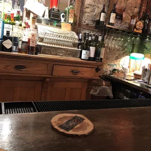 a bar with a lot of bottles